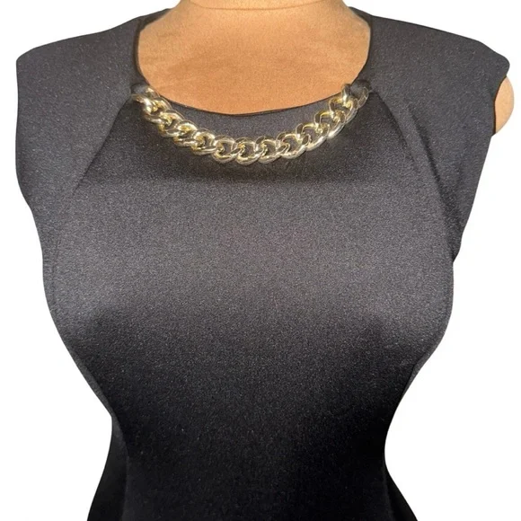 CALVIN KLEIN
Pre-loved Black Dress with Chain Accent💕
Size: 8 - Picture 2 of 10